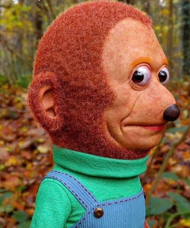 The original Awkward Look Monkey Puppet, the reference for colour, eyes, rounded ears and material